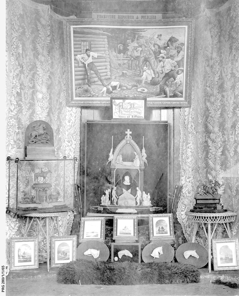 A display of wax sculpture and paintings by W.J. Allom • Photograph