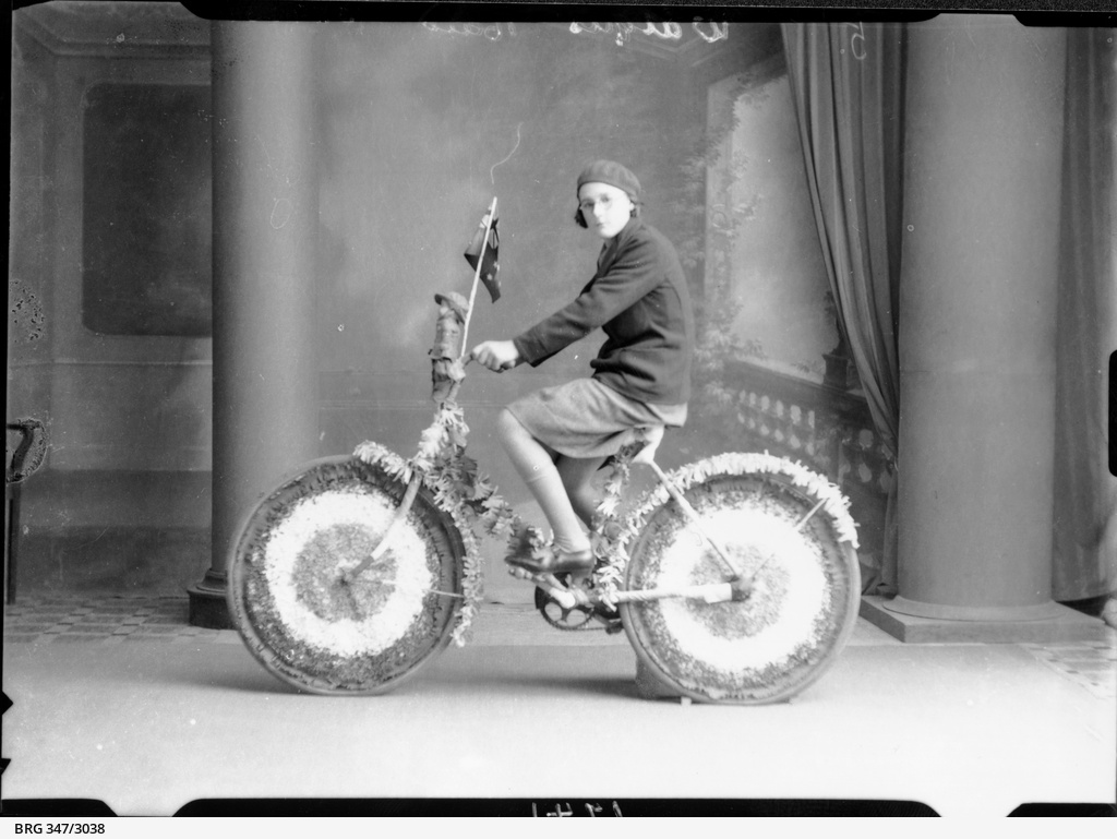 Decorated bicycle and rider • Photograph • State Library of South Australia